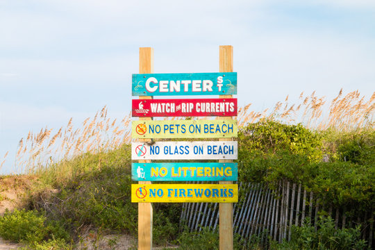 caution signage at a georgia beach