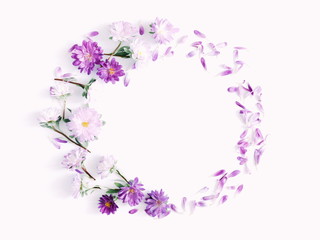 Fototapeta na wymiar Floral composition. Frame made of fresh flowers on white background. Flat lay, top view, copy space 