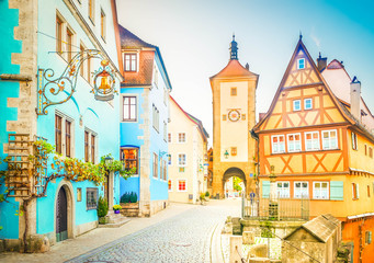 Fototapeta na wymiar half-timbered houses and city tower of Rothenburg ob der Tauber, Germany, retro toned