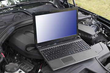 car engine with computer for diagnosis and repair