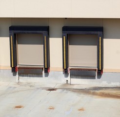 The two garage doors on the building. 