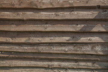 Old fence of rough boards