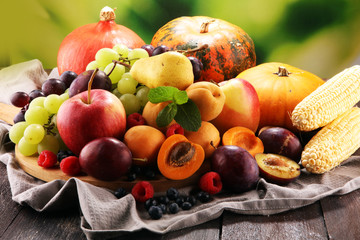 Fresh summer fruits with apple, grapes, berries, pear and apricot