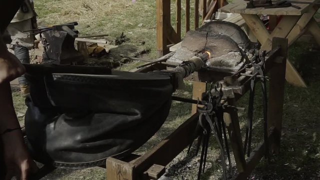 In a historic outdoor smithy