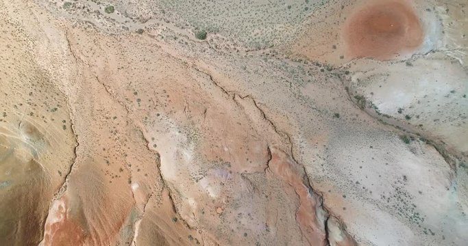 AERIAL flew over the dramatic surface of the planet Mars. Red mountains, Altai