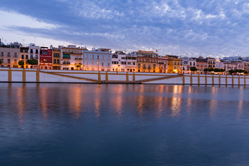 Seville, Spain, Night view of the fashionable and historic districts of Triana