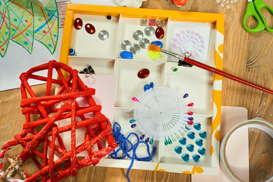 Handmade decorations for new year and other holidays. Artwork workplace with creative accessories.