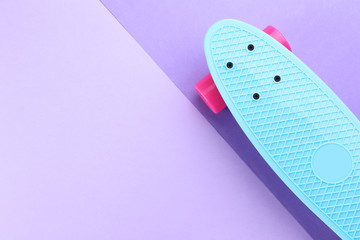 Skateboard on colorful background