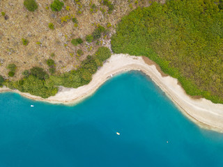 Kournas lake aerial drone top view. Beautiful lake shore in Crete island, Greece.