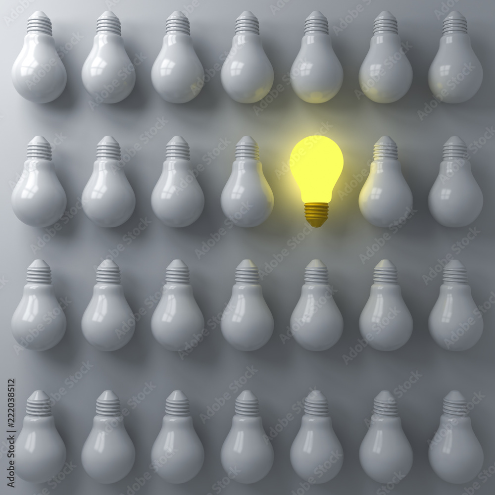 Fototapete one glowing light bulb standing out from the unlit or dim bulbs on dark white background individuali