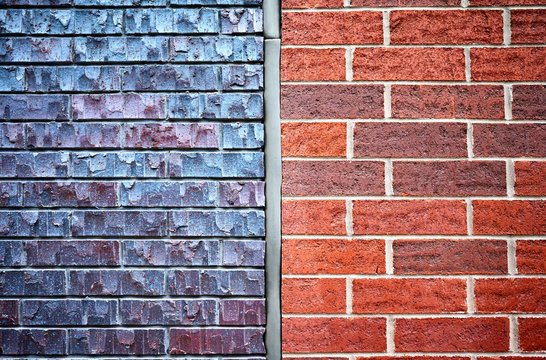 Clinker And Red Bricks Wall Divided Into Two Equal Parts.