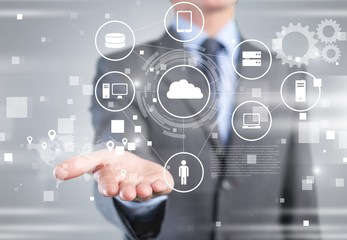 Business and technology concept. Man touching business elements