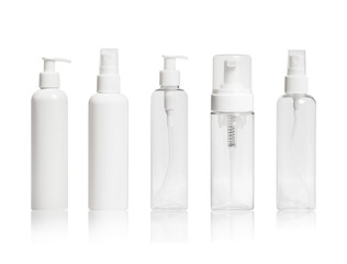 Set of blank cosmetic bottles close-up on white background