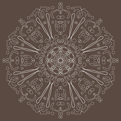 circular white contouring ornament on a gray-brown background