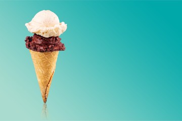 Tasty ,sweet Ice Cream  in the cone on background