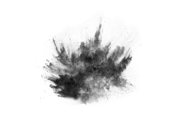 particles of charcoal on white background,abstract powder splatted on white background,Freeze motion of black powder exploding or throwing black powder.