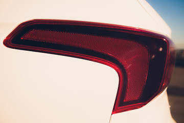 Close up projector Taillight modern and elegant car, automotive part concept