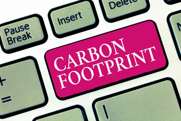 Text sign showing Carbon Footprint. Conceptual photo amount of dioxide released atmosphere result...