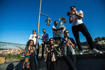 Jazz band, a group of musicians play music in the promenade front of Douro river at downtown of Porto, Portugal. © De Visu