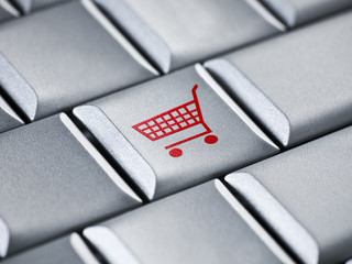 Online shopping cart checkout idea on a computer laptop keyboard