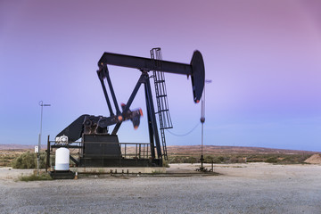 Crude oil pumps natural resources from the ground in California USA