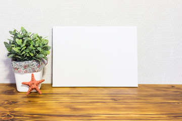 Mockup poster frame in interior. Horizontal white canvas with copy space for text or photo.