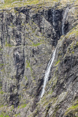 Fototapeta na wymiar waterfall in rocky mountains, Norway.