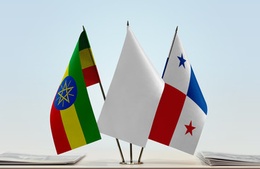 Flags of Ethiopia and Panama with a white flag in the middle