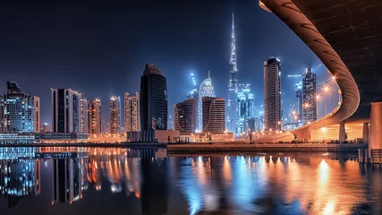 Fotobehang Dubai stad bij nacht © Stockbym