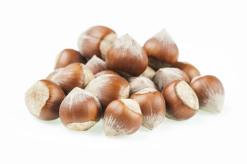 Shelled Hazelnuts is important for health on white background