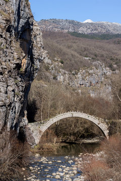 Landscape of Ancient Bridge of Kontodimos or Lazaridis in Vikos gorge and Pindus Mountains, Zagori, Epirus, Greece