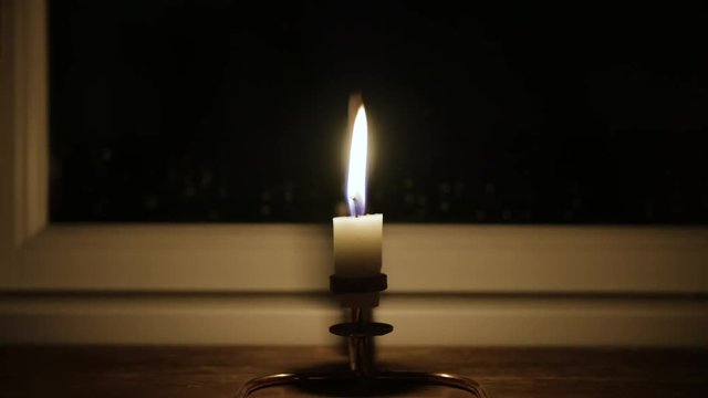 Timelapse of a candle burning down.