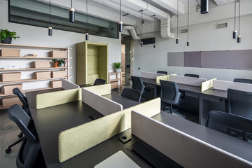 Stylish office in loft style with gray walls