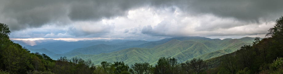 Early Sunset Light Breaks Through Clouds Over Blue Ridge Mountains