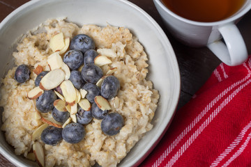 Oatmeal with Blueberries and Tea with Red Napkin