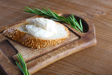 processed cheese bread on a wooden background