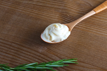 Fototapeta na wymiar processed cheese in a spoon background
