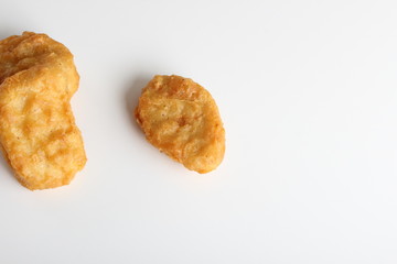 nuggets chicken deep fried on white background