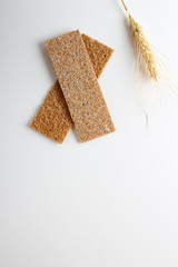 rye cpispbread on a white background