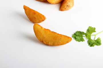 Fototapeta na wymiar country slices potatoes on white background