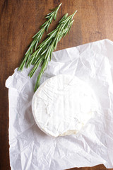 cheese brie wooden background rosemary