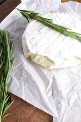 cheese brie wooden background rosemary