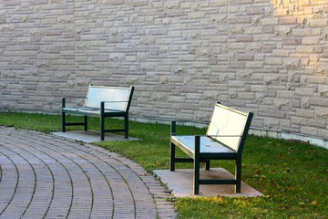 Fototapeta na wymiar Two park benches