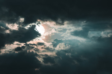 Obraz premium Bright moon behind partial cloudy with moonlight, serenity nature background.