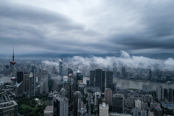 Obraz premium aerial view of buildings of Shanghai city in a stormy day