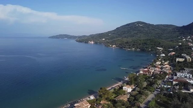Greece, Corfu Island, drone footage of Messonghi Beach, Moraitika. Pan Shot.