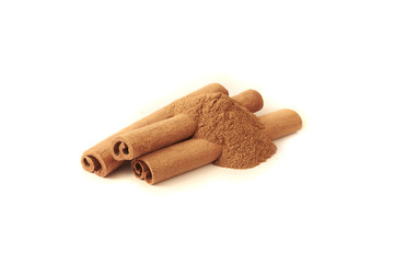 Cinnamon sticks and powder on white background