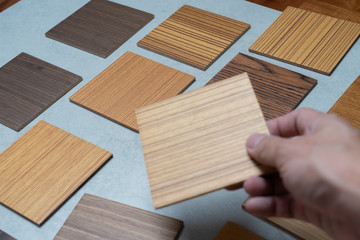 samples of material, wood , on concrete table.Interior design select material for idea.