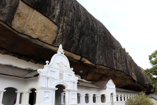 The Dambulla Cave Temple, under an overhanging rock. The largest in Sri Lanka.