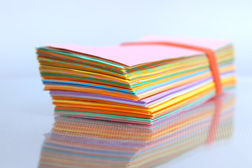 Extreme close up shot of stack of color papers